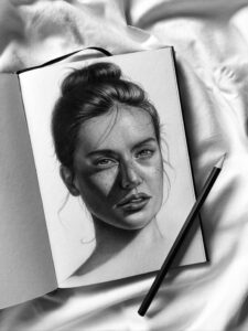 Best Pencil Drawing Artist in Kerala india showing her potrait drawing